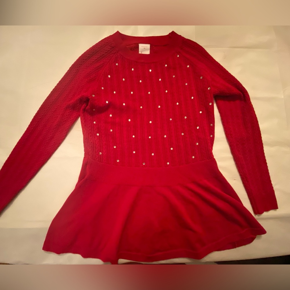 Beautiful Luna Red peplum top with rhinestones.